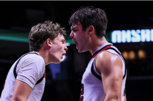Teammates Kraus and Kornmann celebrate after being fouled on a tough layup